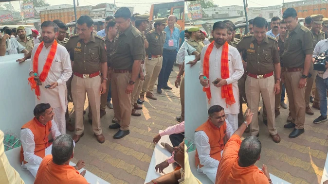 गढ़मुक्तेश्वर में यशवीर महाराज को पुलिस ने मेला क्षेत्र में जाने से रोका, धरने पर बैठे